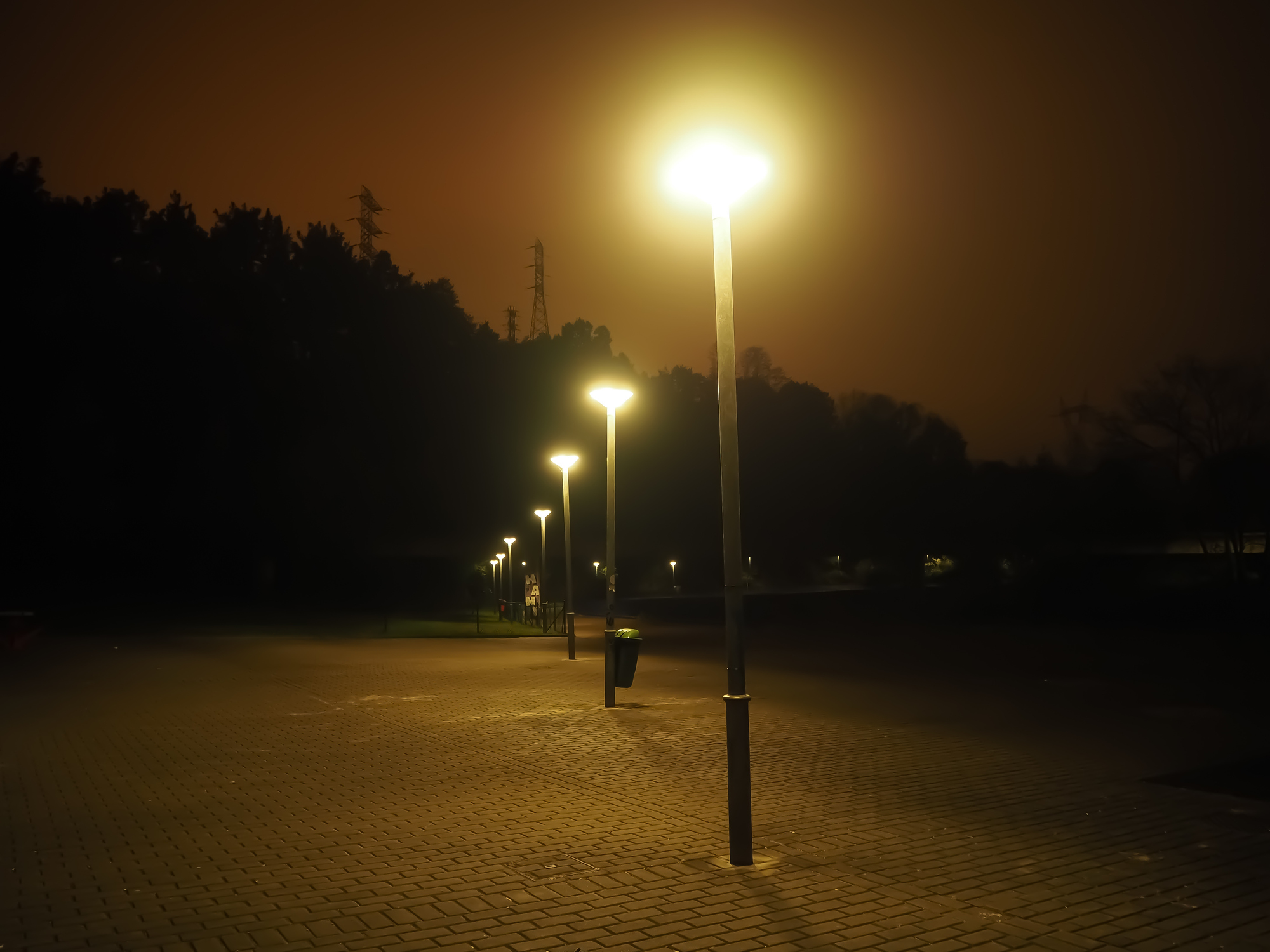 street lamps emitting light pollution
